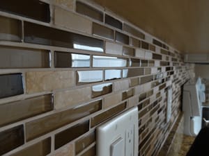 Kitchen back splash cleaning article